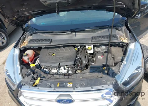 2017 Ford Escape Titanium z USA, uszkodzony, nr VIN 1FMCU0JD6HUE23085